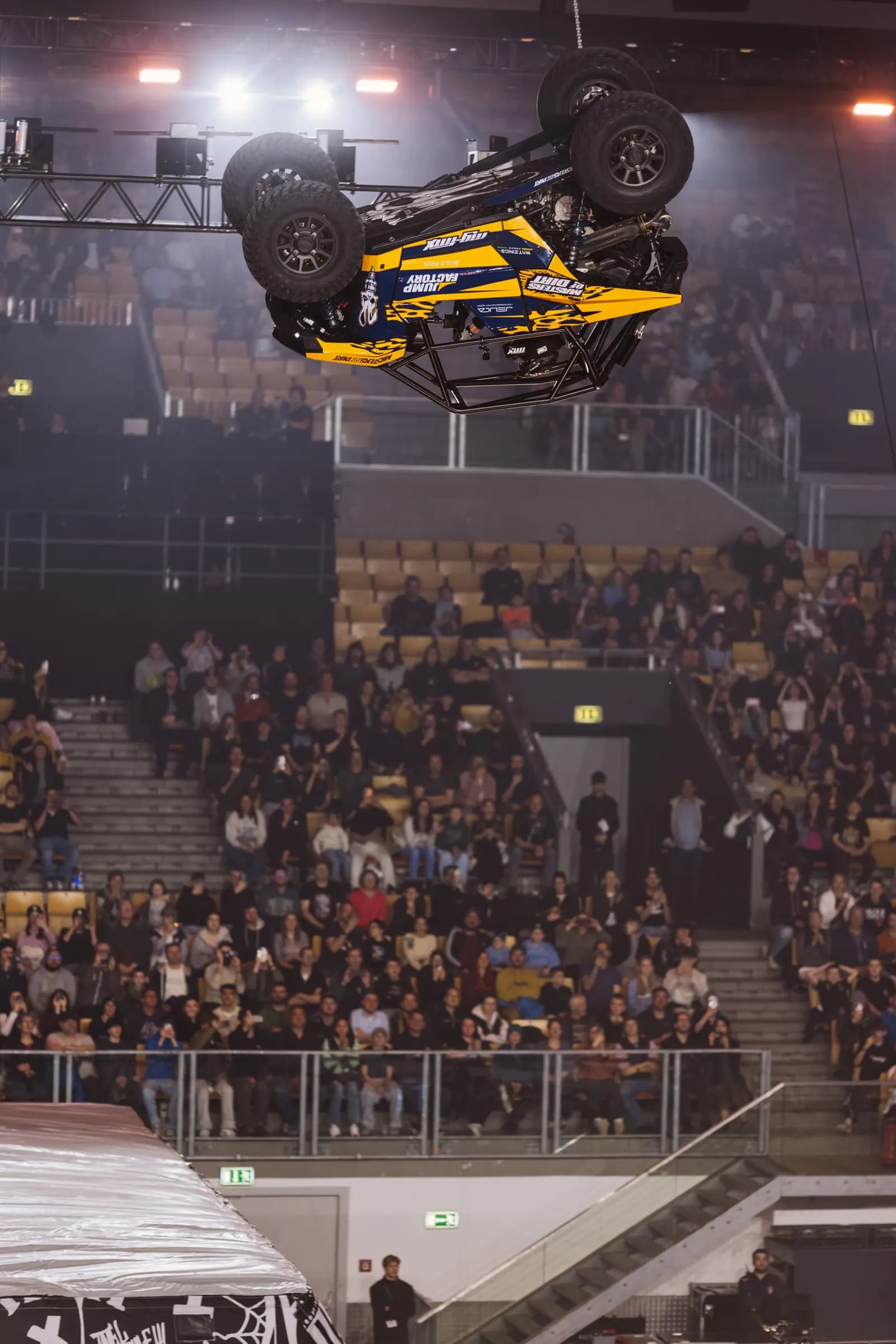 Gerhard Mayr's buggy flying upside down through Olympiahalle Innsbruck