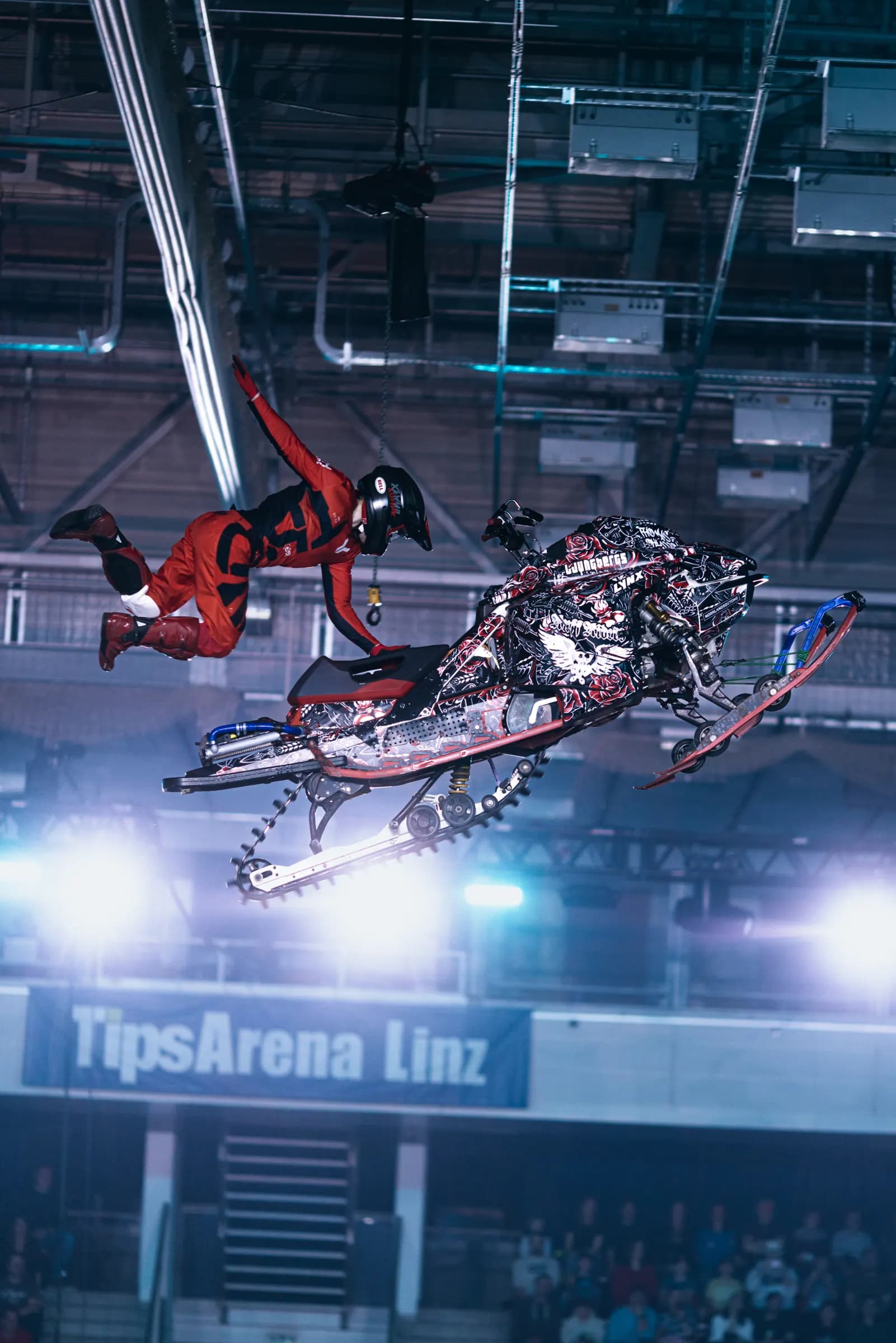 Snowmobile backflip at TipsArena Linz