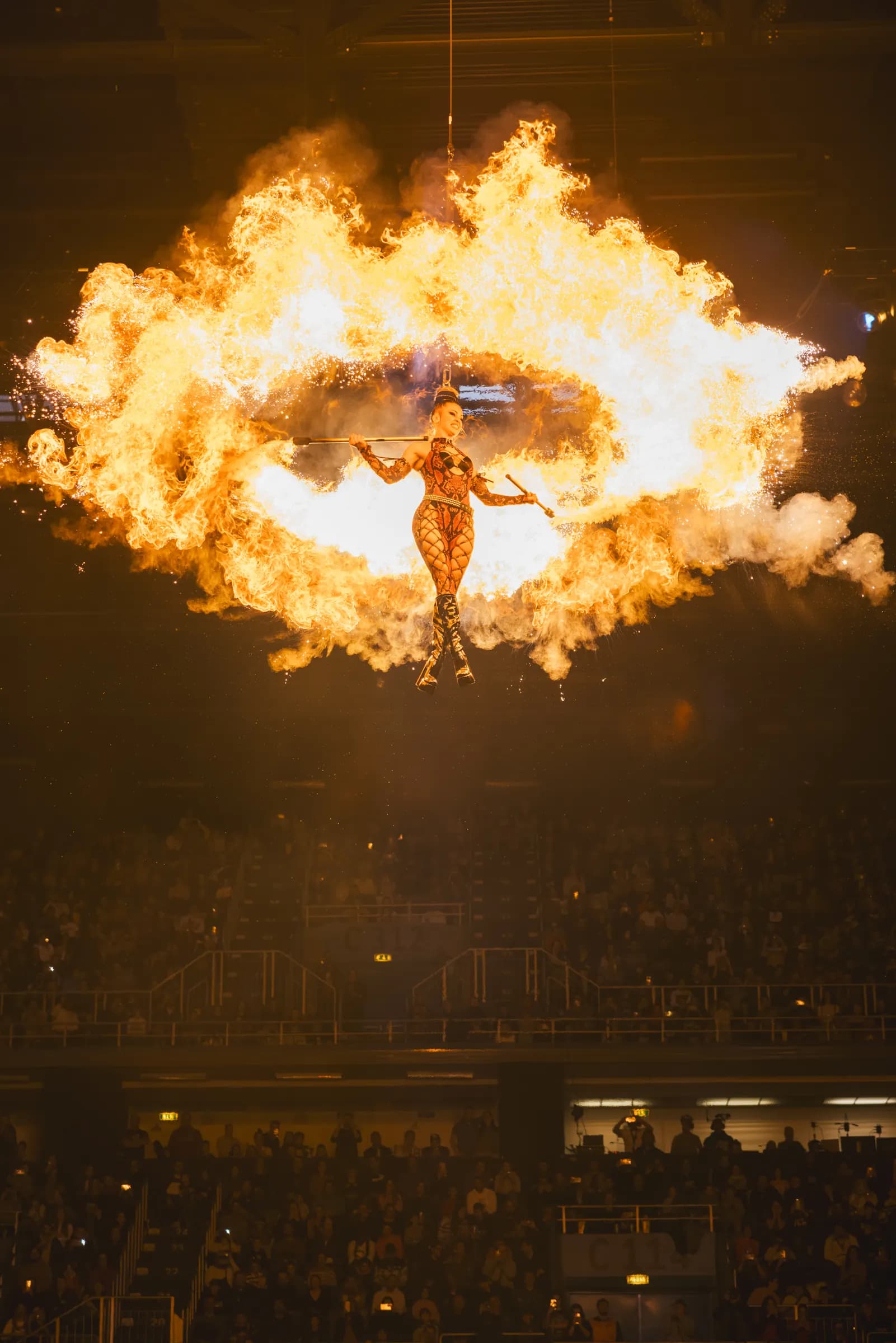 Fuel Girls fire show: a performer inside a ring of flames